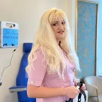 Dr. Laura Minela Tacu